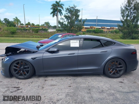 2023 Tesla Model S with VIN 5YJSA1E54PF501565, listed as a IAAI auction lot 42244953 with Not provided miles and . Bid and sale history available at DreamBid. Image 13.