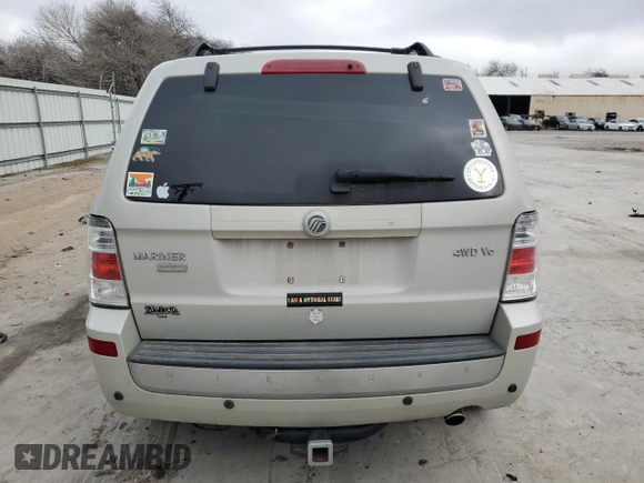 2008 Mercury Mariner Premier z VIN 4M2CU97188KJ41798, wystawiony jako Copart lot #43960565 z przebiegiem 154 302 mil mil oraz Szkody całkowita. Historia ofert i sprzedaży dostępna na DreamBid. Obrazek 6.