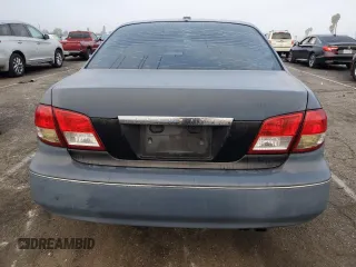 2004 Infiniti I35 z VIN JNKDA31A54T212810, wystawiony jako Copart lot #72467654 z przebiegiem 137 809 mil mil oraz Szkoda całkowita • Salvage title. Historia ofert i sprzedaży dostępna na DreamBid. Obrazek 6.