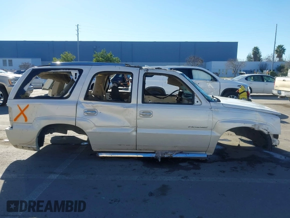 2005 Cadillac Escalade z VIN 1GYEK63N15R161254, wystawiony jako IAAI lot #41329738 z przebiegiem Nie podano mil oraz . Historia ofert i sprzedaży dostępna na DreamBid. Obrazek 12.