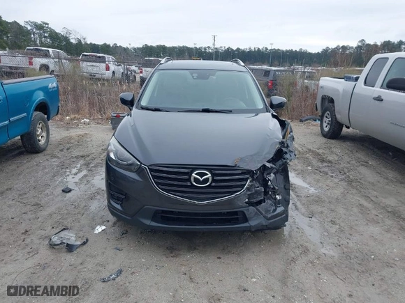 2016 Mazda CX-5 Grand Touring with VIN JM3KE4DY8G0796290, listed as a IAAI auction lot 41619977 with NaN miles. Bid and sale history available at carsss.com. Image 12.
