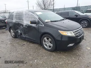 2013 Honda Odyssey Touring with VIN 5FNRL5H97DB059472, listed as a IAAI auction lot 41856559 with Not Provided miles and . Bid and sale history available at carsss.com. Image 1.