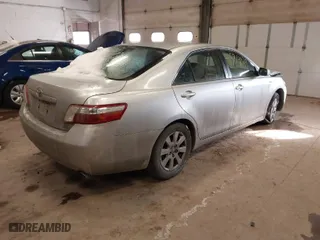 2007 Toyota Camry Hybrid with VIN JTNBB46K073026945, listed as a IAAI auction lot 41584029 with 233,388 mi miles. Bid and sale history available at carsss.com. Image 4.