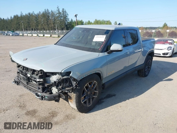 2022 Rivian R1T Adventure z VIN 7FCTGAAA5NN007018, wystawiony jako IAAI lot #42018939 z przebiegiem 41 991 mil mil oraz . Historia ofert i sprzedaży dostępna na DreamBid. Obrazek 21.