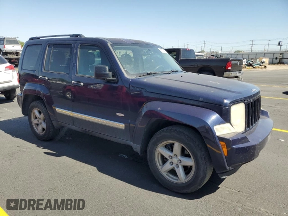 2012 Jeep Liberty Sport with VIN 1C4PJMAK5CW182377, listed as a Copart auction lot 57671345 with 140,236 mi miles and Salvage title. Bid and sale history available at DreamBid. Image 4.
