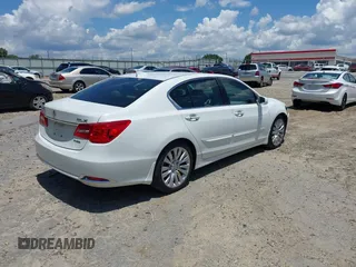 2014 Acura RLX Technology with VIN JH4KC1F55EC000427, listed as a IAAI auction lot 42705778 with 135,057 mi miles and . Bid and sale history available at DreamBid. Image 4.