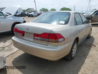 2002 Honda Accord LX z VIN 3HGCG56422G709092, wystawiony jako IAAI lot #42214711 z przebiegiem 94 386 mil mil oraz . Historia ofert i sprzedaży dostępna na DreamBid. Obrazek 4.