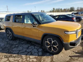 2023 Rivian R1S Adventure z VIN 7PDSGABA1PN009442, wystawiony jako Copart lot #45375605 z przebiegiem 28 047 mil mil oraz Szkody całkowita. Historia ofert i sprzedaży dostępna na DreamBid. Obrazek 4.