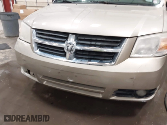 2009 Dodge Grand Caravan SXT z VIN 2D8HN541X9R652097, wystawiony jako IAAI lot #42370946 z przebiegiem 189 911 mil mil oraz . Historia ofert i sprzedaży dostępna na DreamBid. Obrazek 16.