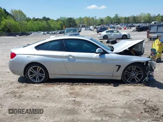 2014 BMW 4 Series 428i with VIN WBA3N7C50EK220438, listed as a IAAI auction lot 41990873 with 141,736 mi miles and . Bid and sale history available at carsss.com. Image 13.