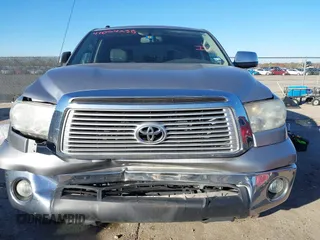 2012 Toyota Tundra 4WD Truck LTD with VIN 5TFHW5F18CX251584, listed as a IAAI auction lot 41054238 with 124,892 mi miles. Bid and sale history available at carsss.com. Image 12.