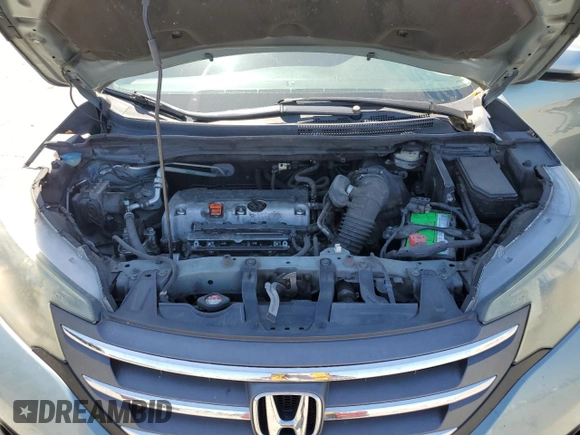 2012 Honda CR-V EX-L with VIN 2HKRM4H79CH632393, listed as a Copart auction lot 57844555 with 219,258 mi miles and Salvage title. Bid and sale history available at DreamBid. Image 12.
