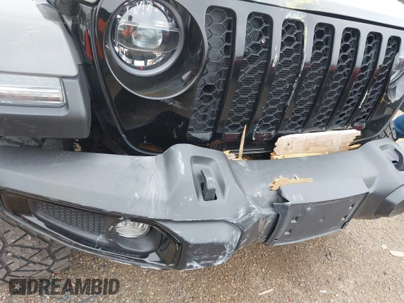 2022 Jeep Gladiator Texas Trail z VIN 1C6HJTAG2NL176011, wystawiony jako IAAI lot #42193864 z przebiegiem 27 219 mil mil oraz . Historia ofert i sprzedaży dostępna na DreamBid. Obrazek 20.