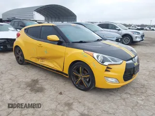 2013 Hyundai Veloster w/Black Int with VIN KMHTC6AD4DU167576, listed as a IAAI auction lot 41491479 with 90,033 mi miles and . Bid and sale history available at DreamBid. Image 1.