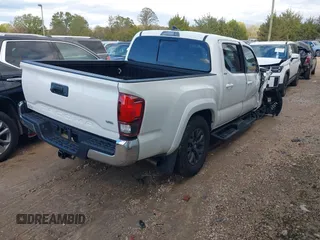 2023 Toyota Tacoma SR5 z VIN 3TYAZ5CN6PT039427, wystawiony jako IAAI lot #40866490 z przebiegiem 18 481 mil mil oraz . Historia ofert i sprzedaży dostępna na DreamBid. Obrazek 4.