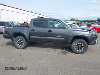 2020 Toyota Tacoma SR5 with VIN 3TMCZ5AN7LM321061, listed as a IAAI auction lot 41985533 with 32,111 mi miles and . Bid and sale history available at DreamBid. Image 14.
