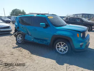 2020 Jeep Renegade Latitude with VIN ZACNJAB10LPM09870, listed as a IAAI auction lot 42063390 with 59,201 mi miles. Bid and sale history available at carsss.com. Image 1.