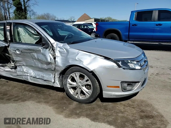 2012 Ford Fusion SE with VIN 3FAHP0HG1CR323080, listed as a Copart auction lot 53715485 with 109,179 mi miles and Salvage title. Bid and sale history available at DreamBid. Image 11.