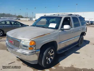 2005 GMC Yukon SLT with VIN 1GKEC13T15R144480, listed as a IAAI auction lot 41632540 with 184,038 mi miles. Bid and sale history available at carsss.com. Image 2.