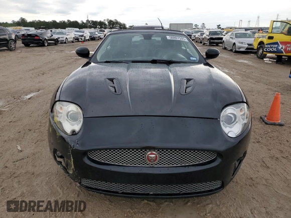 2007 Jaguar XK XKR with VIN SAJWA44C879B19251, listed as a Copart auction lot 50807595 with 100,715 mi miles and Salvage Title. Bid and sale history available at DreamBid. Image 5.