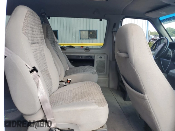 2002 Ford Econoline Passenger XL with VIN 1FMRE11WX2HA57114, listed as a Copart auction lot 68766174 with 167,382 mi miles and Salvage Title. Bid and sale history available at DreamBid. Image 11.