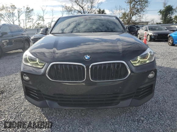 2019 BMW X2 sDrive28i with VIN WBXYJ3C56K5N36579, listed as a Copart auction lot 88320995 with 66,143 mi miles and Salvage Title. Bid and sale history available at carsss.com. Image 5.