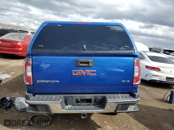 2019 GMC Canyon z VIN 1GTP6CE12K1174133, wystawiony jako Copart lot #51242875 z przebiegiem 182 902 mil mil oraz Szkoda całkowita • Salvage title. Historia ofert i sprzedaży dostępna na DreamBid. Obrazek 6.