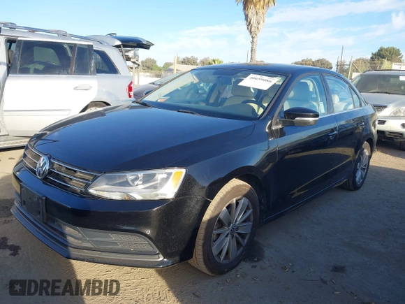 2015 Volkswagen Jetta Sedan 1.8T SE with VIN 3VWD17AJ3FM407697, listed as a IAAI auction lot 40659086 with 107,834 mi miles. Bid and sale history available at carsss.com. Image 17.