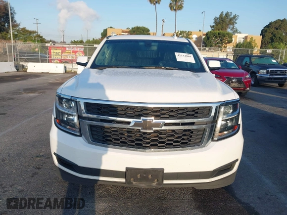 2018 Chevrolet Suburban LS with VIN 1GNSKGKC5JR173889, listed as a IAAI auction lot 42152865 with 73,358 mi miles and . Bid and sale history available at DreamBid. Image 12.