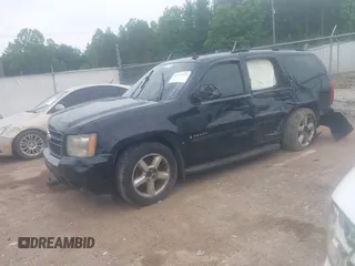 2007 Chevrolet Tahoe LT z VIN 1GNFK13097R132998, wystawiony jako IAAI lot #42257393 z przebiegiem 288 126 mil mil oraz . Historia ofert i sprzedaży dostępna na DreamBid. Obrazek 20.