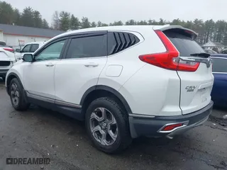 2019 Honda CR-V EX-L with VIN JHLRW2H86KX001274, listed as a IAAI auction lot 41953859 with 73,599 mi miles. Bid and sale history available at carsss.com. Image 3.