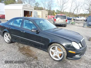 2009 Mercedes-Benz E-Class Luxury 3.5L with VIN WDBUF87X49B423293, listed as a IAAI auction lot 41582775 with 124,297 mi miles. Bid and sale history available at carsss.com. Image 1.