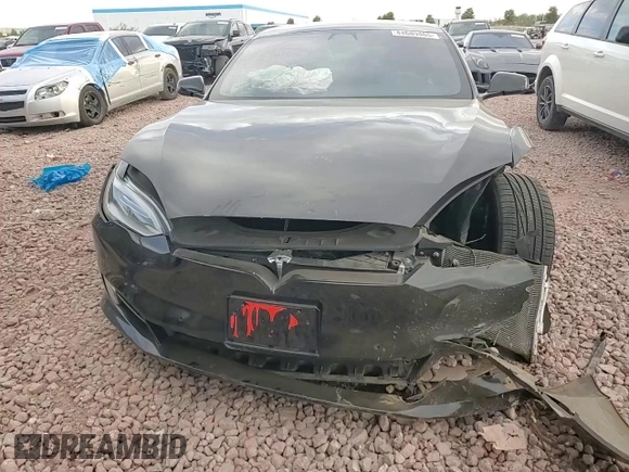 2017 Tesla Model S 60 z VIN 5YJSA1E15HF218686, wystawiony jako Copart lot #44689465 z przebiegiem 101 964 mil mil oraz Szkoda całkowita • Salvage title. Historia ofert i sprzedaży dostępna na DreamBid. Obrazek 10.