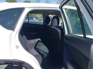 2015 Mazda CX-5 Sport with VIN JM3KE4BY3F0495511, listed as a IAAI auction lot 42170968 with 206,217 mi miles and . Bid and sale history available at carsss.com. Image 8.
