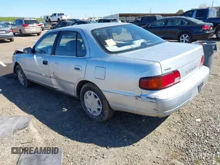 1996 Toyota Camry DX with VIN JT2BG12K4T0381387, listed as a IAAI auction lot 41866017 with 177,198 mi miles. Bid and sale history available at carsss.com. Image 3.
