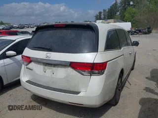 2016 Honda Odyssey EX-L with VIN 5FNRL5H68GB128552, listed as a IAAI auction lot 41947677 with 213,255 mi miles and . Bid and sale history available at DreamBid. Image 4.