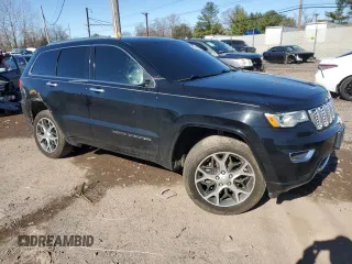 2019 Jeep Grand Cherokee Overland with VIN 1C4RJFCG9KC569575, listed as a Copart auction lot 48952875 with 87,053 mi miles and Salvage Title. Bid and sale history available at carsss.com. Image 4.
