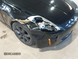 2004 Nissan 350Z Enthusiast with VIN JN1AZ34D84M100096, listed as a IAAI auction lot 41352466 with Not Provided miles and . Bid and sale history available at DreamBid. Image 6.