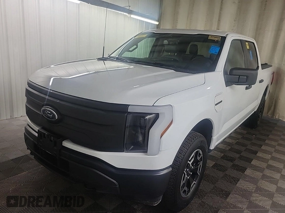 2023 Ford F-150 Lightning Pro z VIN 1FTVW1EL0PWG02840, wystawiony jako IAAI lot #42379448 z przebiegiem 52 710 mil mil oraz . Historia ofert i sprzedaży dostępna na DreamBid. Obrazek 4.
