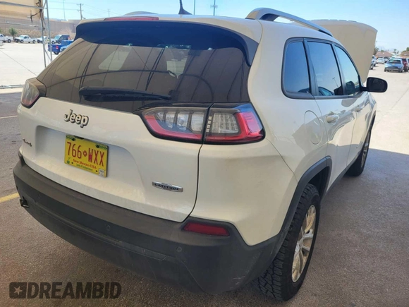 2020 Jeep Cherokee Latitude with VIN 1C4PJMCB1LD602371, listed as a IAAI auction lot 42806971 with 81,291 mi miles and . Bid and sale history available at DreamBid. Image 14.