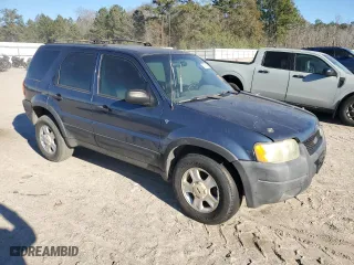 2001 Ford Escape XLT with VIN 1FMYU03171KB12159, listed as a Copart auction lot 87974165 with 0 mi miles and Salvage Title. Bid and sale history available at carsss.com. Image 4.