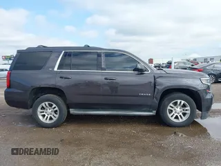 2015 Chevrolet Tahoe LT with VIN 1GNSCBKC2FR632173, listed as a IAAI auction lot 42135105 with 150,033 mi miles and . Bid and sale history available at DreamBid. Image 13.