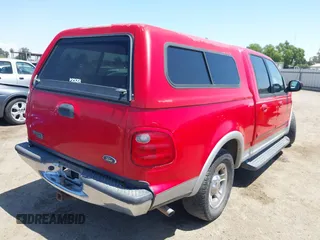 2001 Ford F-150 XLT with VIN 1FTRW07L91KB33447, listed as a IAAI auction lot 42109373 with 134,994 mi miles and . Bid and sale history available at DreamBid. Image 4.