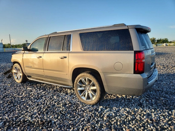 2019 Chevrolet Suburban LT with VIN 1GNSCJKC3KR129739, listed as a Copart auction lot 62377465 with 105,771 mi miles and Salvage title. Bid and sale history available at DreamBid. Image 2.