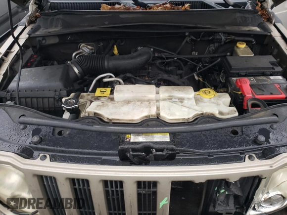 2011 Jeep Liberty Sport Jet with VIN 1J4PP2GK7BW540727, listed as a Copart auction lot 87417434 with 192,473 mi miles and Salvage title. Bid and sale history available at DreamBid. Image 12.