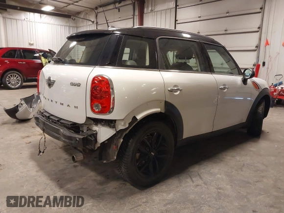 2014 MINI Countryman with VIN WMWZB3C57EWR42476, listed as a IAAI auction lot 41716731 with 94,378 mi miles and . Bid and sale history available at DreamBid. Image 4.