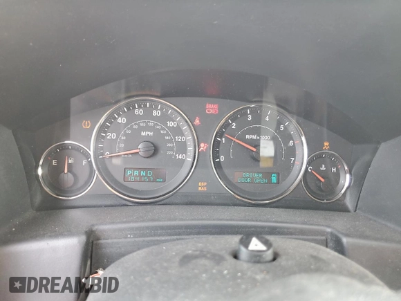2006 Jeep Commander z VIN 1J8HG48K16C195599, wystawiony jako Copart lot #59402935 z przebiegiem 184 157 mil mil oraz Szkoda całkowita • Salvage title. Historia ofert i sprzedaży dostępna na DreamBid. Obrazek 9.