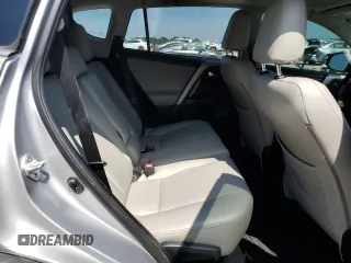 2018 Toyota RAV4 XLE with VIN 2T3WFREVXJW427748, listed as a Copart auction lot 61833055 with 104,057 mi miles and Salvage title. Bid and sale history available at DreamBid. Image 11.