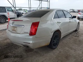 2014 Cadillac CTS RWD z VIN 1G6AP5SXXE0182114, wystawiony jako IAAI lot #42157993 z przebiegiem 132 507 mil mil oraz . Historia ofert i sprzedaży dostępna na DreamBid. Obrazek 4.
