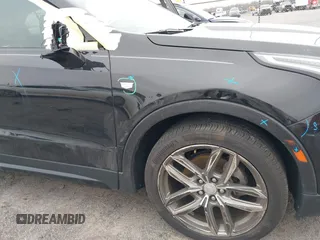 2019 Cadillac XT4 FWD Sport z VIN 1GYFZER49KF178096, wystawiony jako IAAI lot #41611247 z przebiegiem 37 971 mil mil oraz . Historia ofert i sprzedaży dostępna na DreamBid. Obrazek 6.